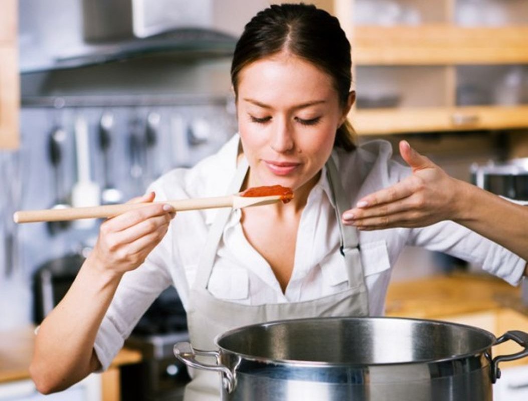 a woman prepares food