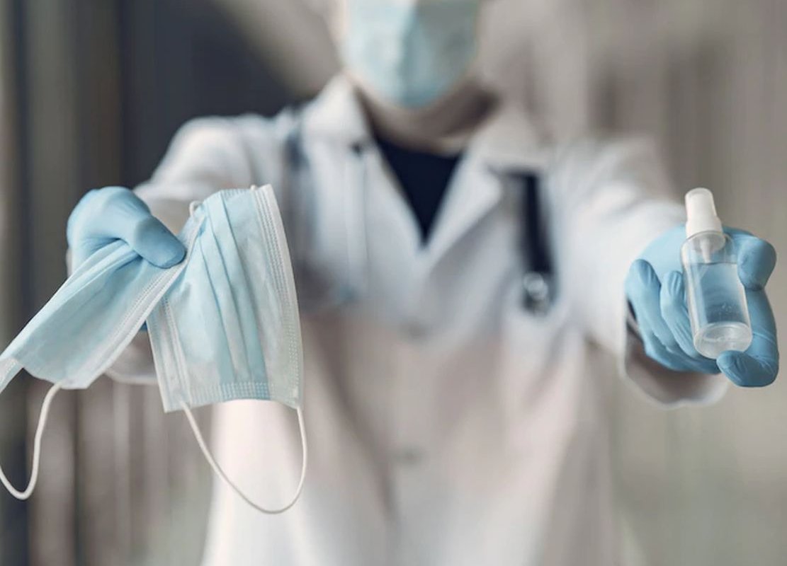 masks in the doctor's hand