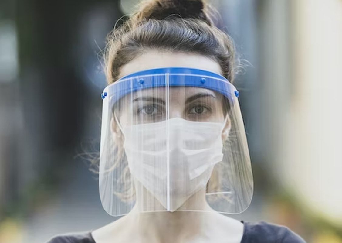 girl with a protective screen on her face