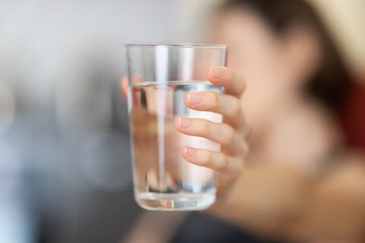 glass of water in hand