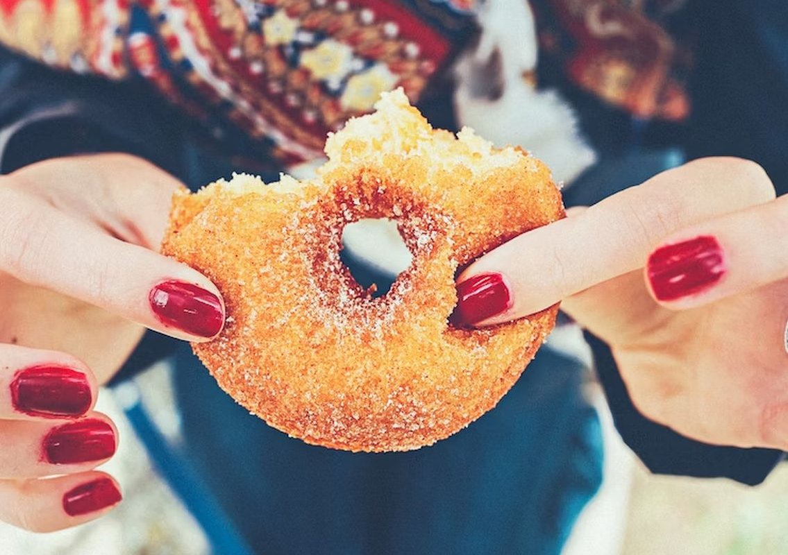 donut in hand