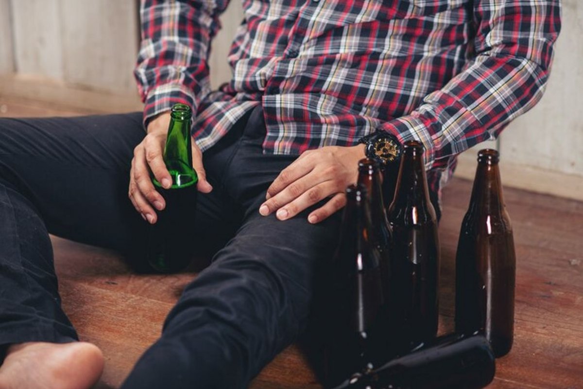 man with beer bottles