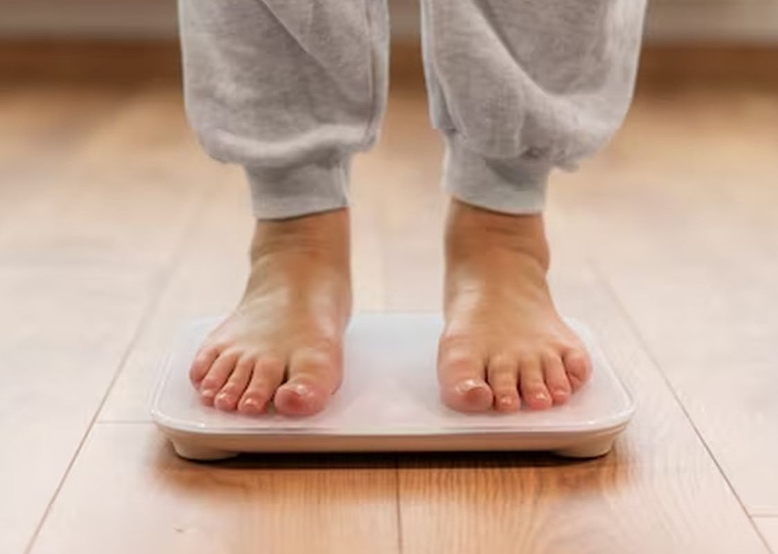 feet on the scale