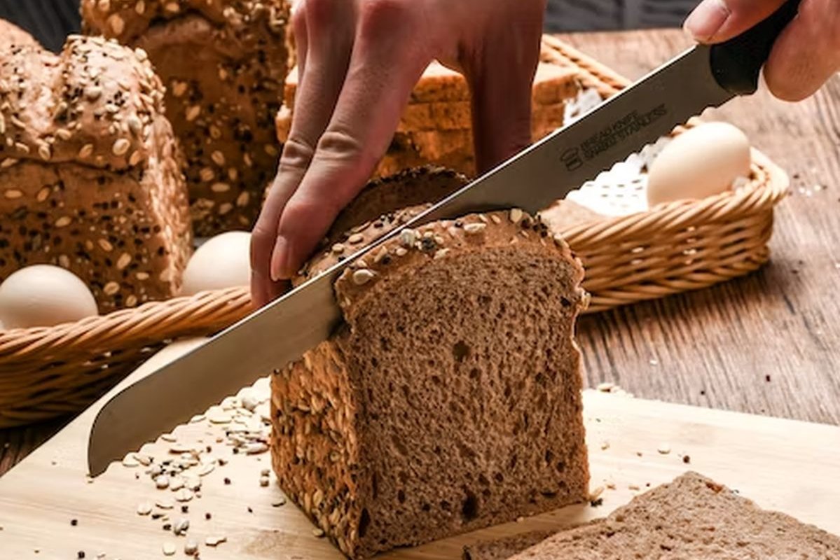 bread is cut with a knife