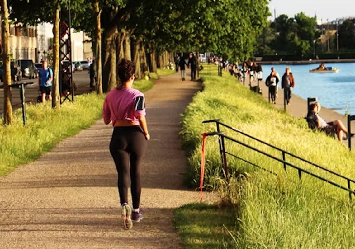 a girl running in the park