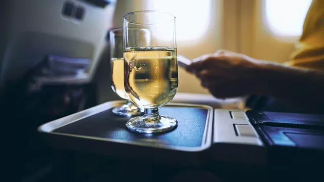 You should avoid alcohol on a plane, especially if you are going to sleep there - new research