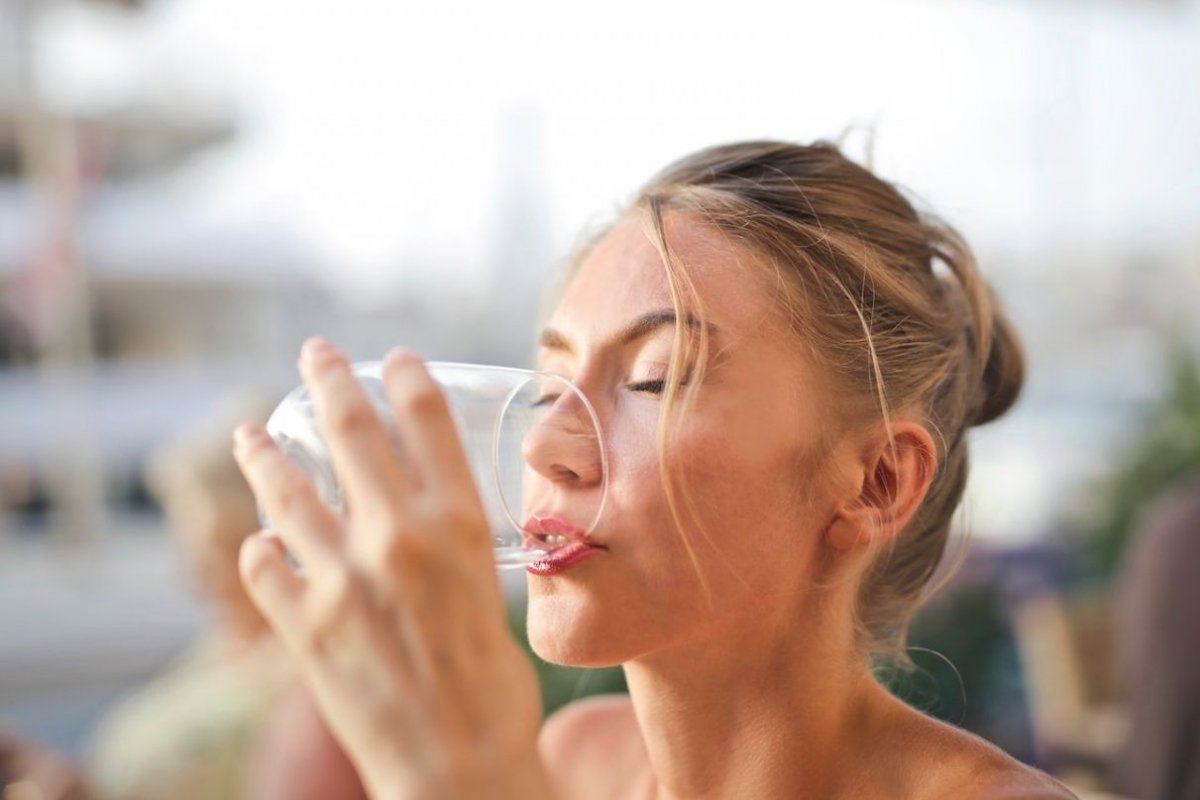 a girl drinks water