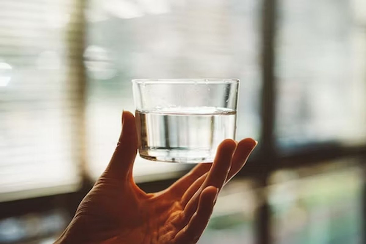 glass of water in hand