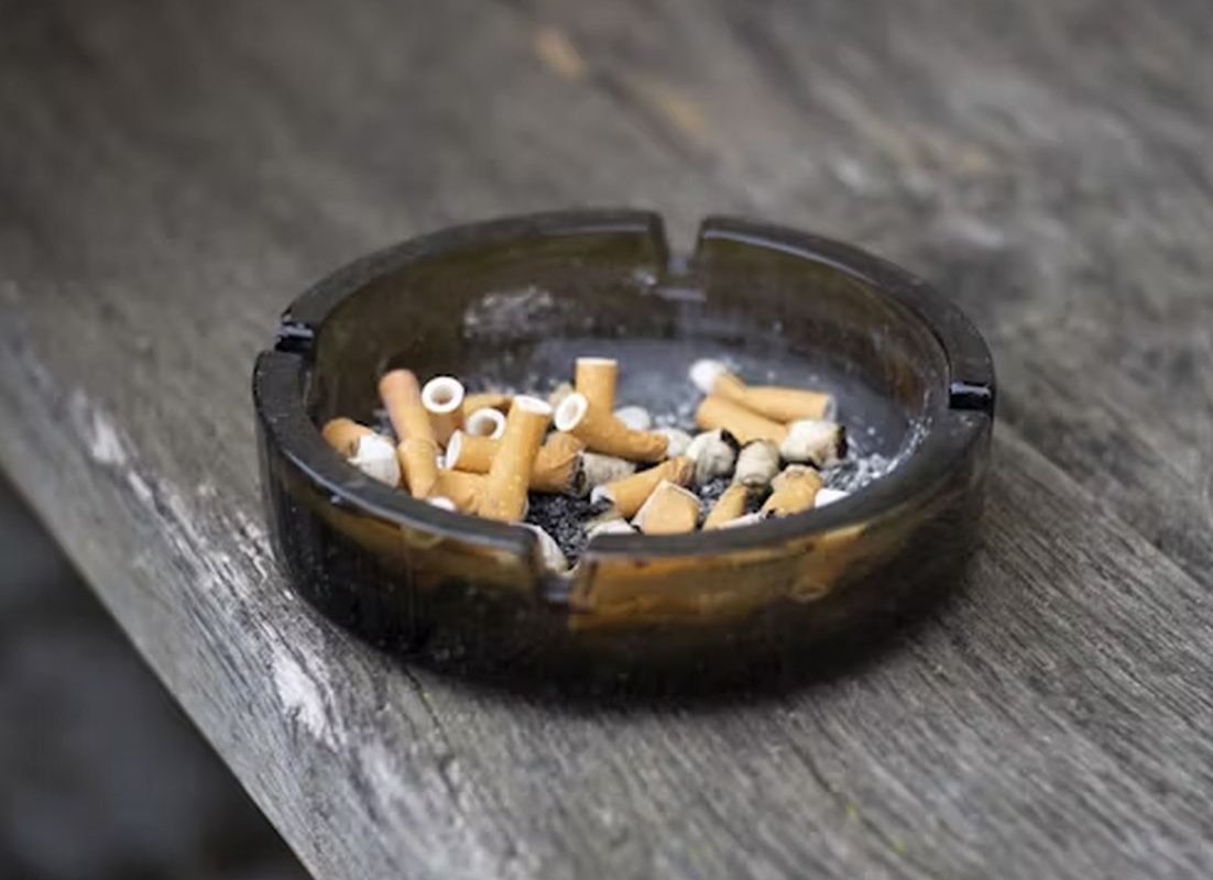 ashtray with cigarette butts