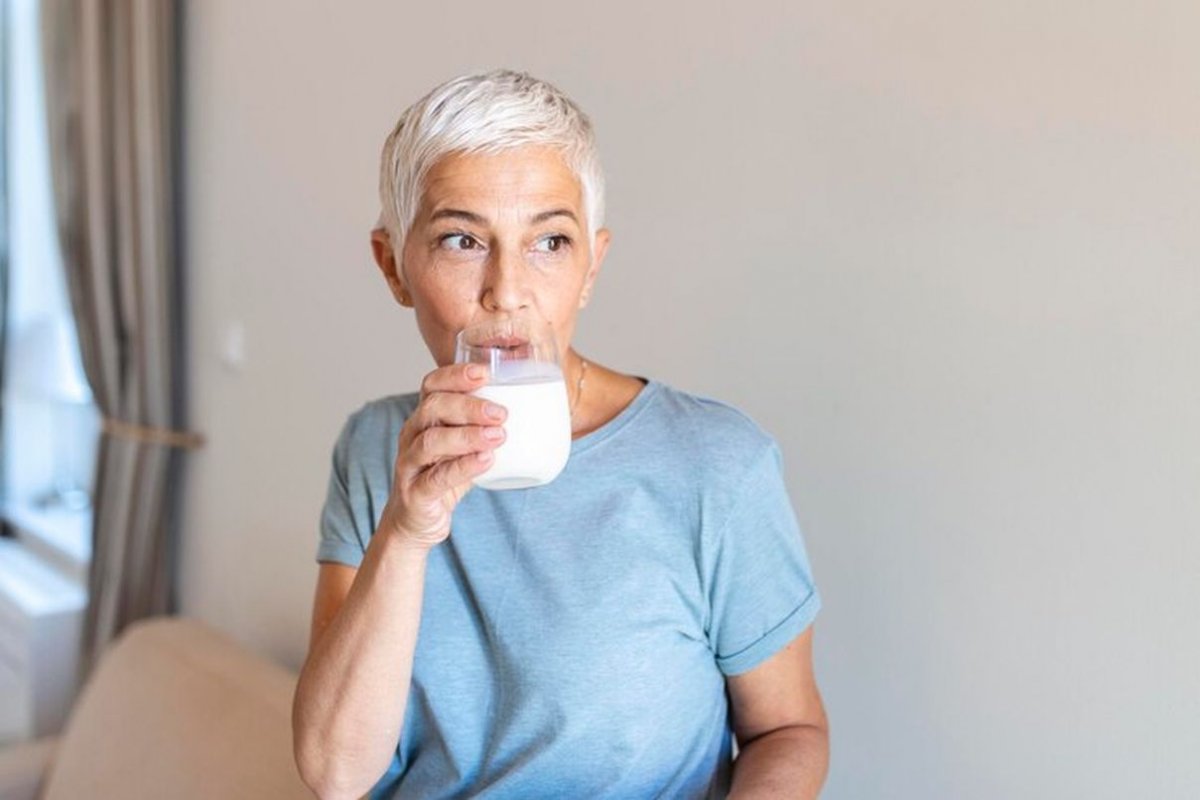 woman drinks milk